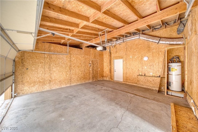 garage featuring secured water heater and a garage door opener