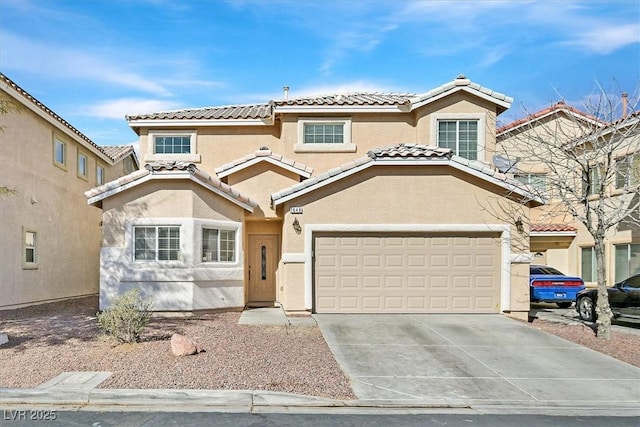 view of front of house with driveway, a tile roof, and stucco siding