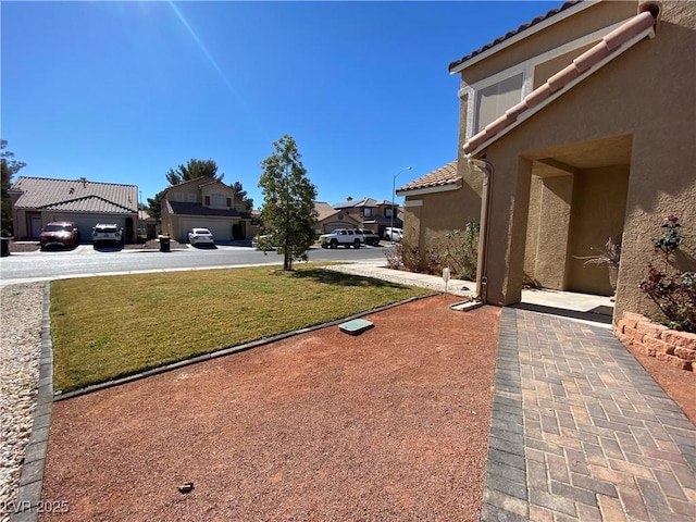 view of yard with a residential view