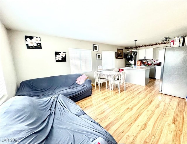 living area with light wood-type flooring