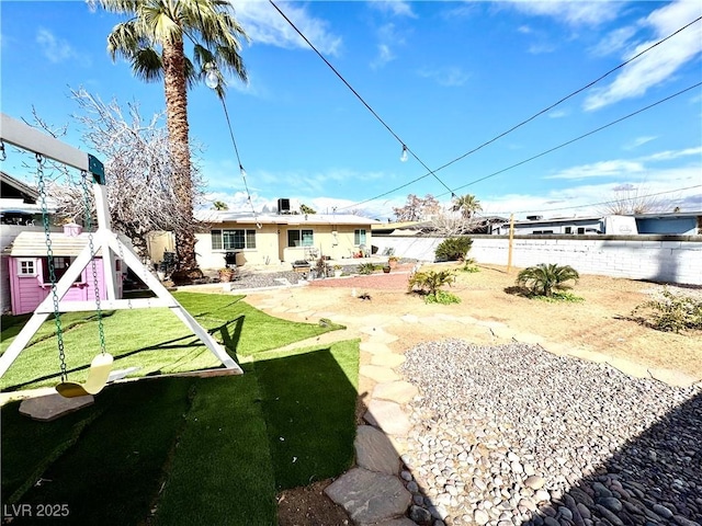 view of yard featuring a fenced backyard