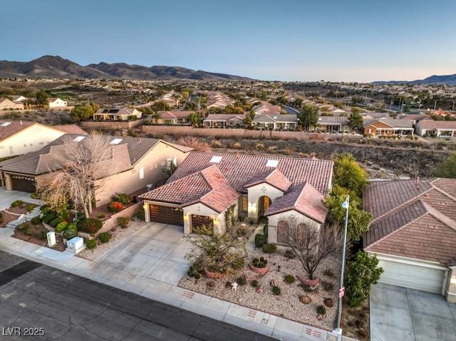 bird's eye view with a residential view and a mountain view