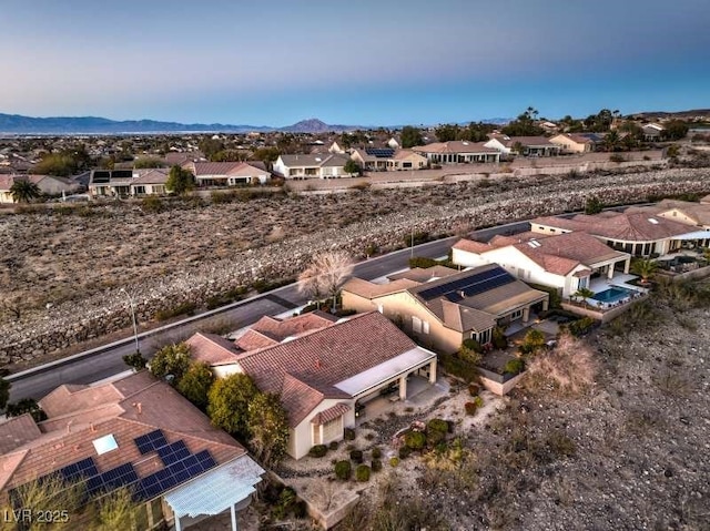 bird's eye view with a residential view and a mountain view