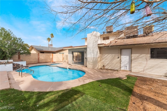 view of swimming pool with a patio, a fenced backyard, and a fenced in pool