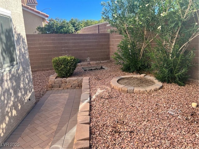 view of yard featuring a fenced backyard and a patio