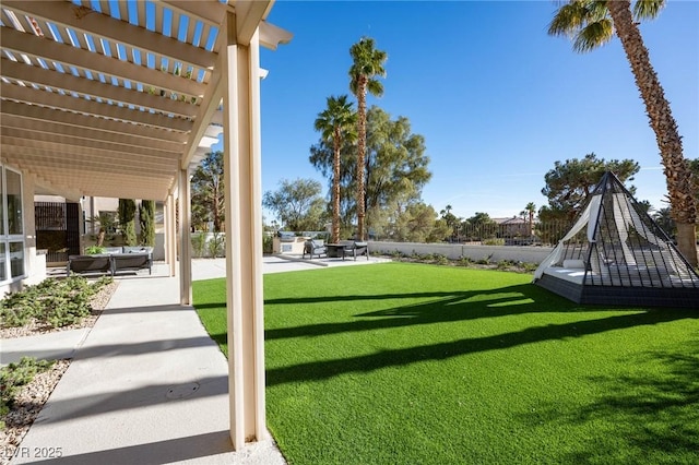 view of yard with a patio area and a pergola