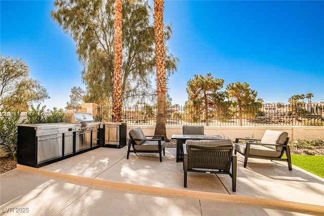 view of patio featuring area for grilling, outdoor lounge area, and fence