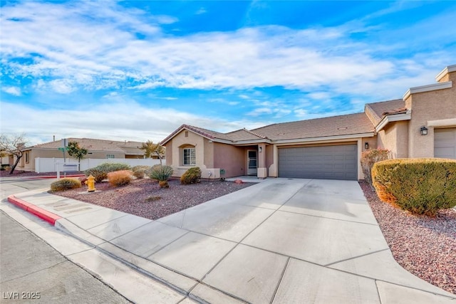 single story home with driveway, a tiled roof, an attached garage, and stucco siding