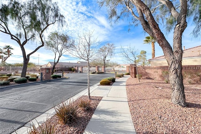 view of road featuring a residential view and sidewalks