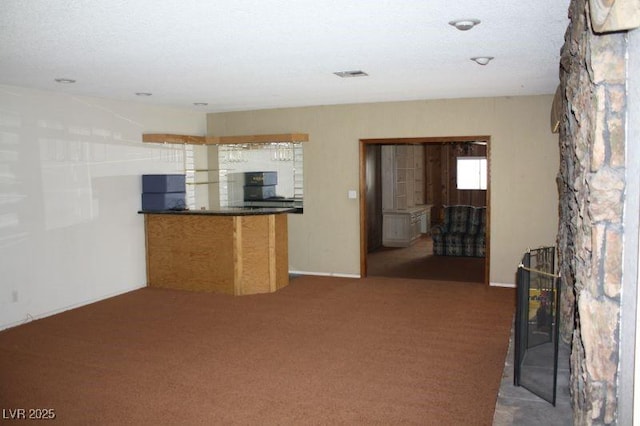 interior space featuring carpet and visible vents