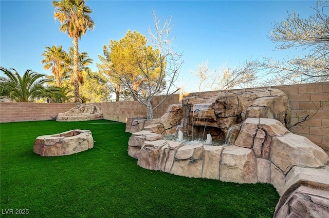 view of yard featuring a fenced backyard