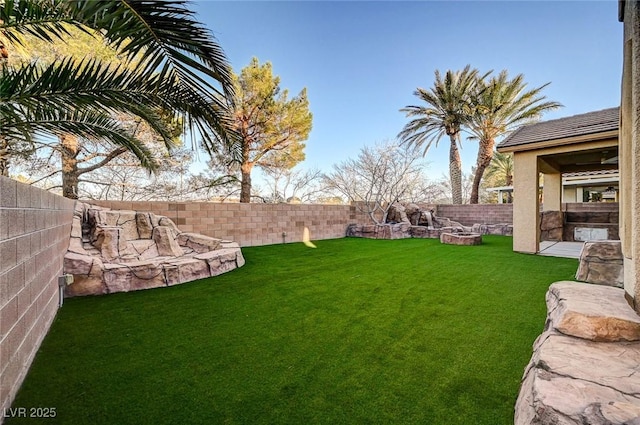 view of yard featuring a fenced backyard