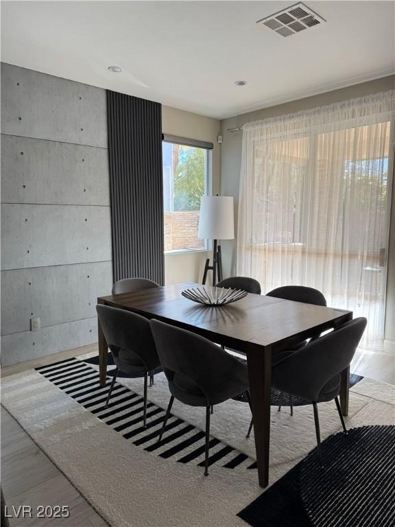 dining area featuring visible vents