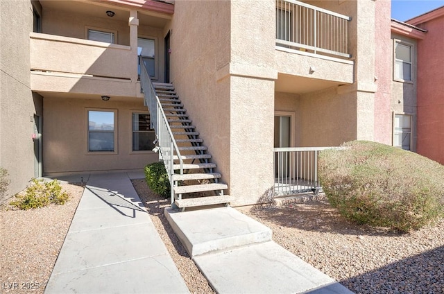 view of building exterior with stairs