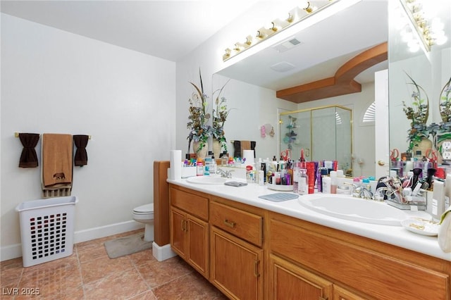 bathroom with double vanity, a sink, visible vents, and a shower stall