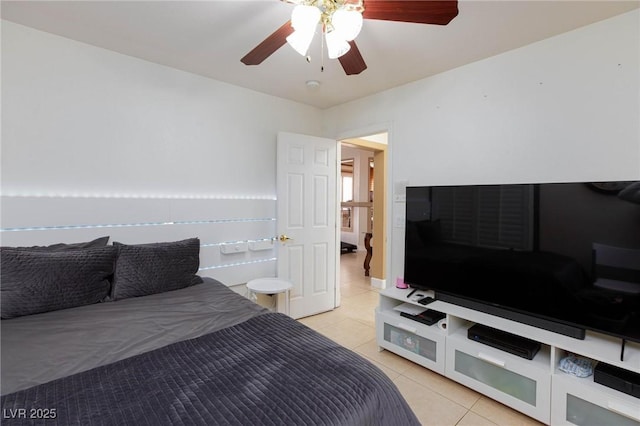 bedroom featuring light tile patterned floors and ceiling fan