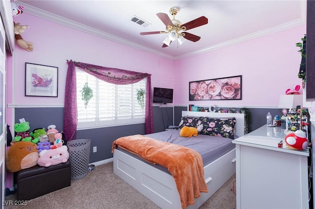 bedroom with ornamental molding, light carpet, ceiling fan, and visible vents