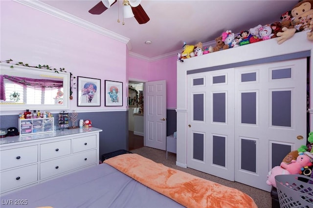 bedroom featuring ceiling fan, dark colored carpet, and crown molding