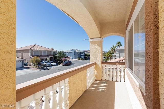 balcony featuring a residential view