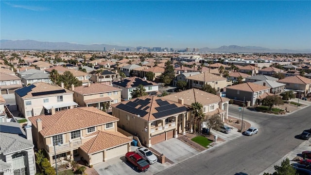 bird's eye view with a residential view and a mountain view