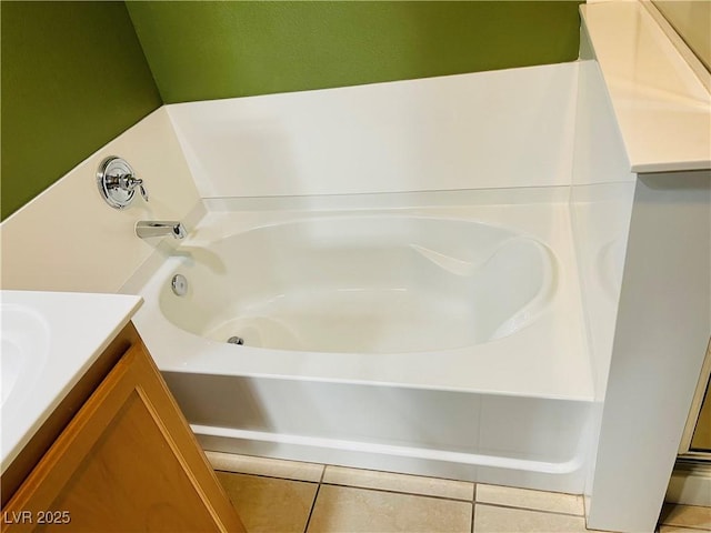 interior details with a garden tub and vanity