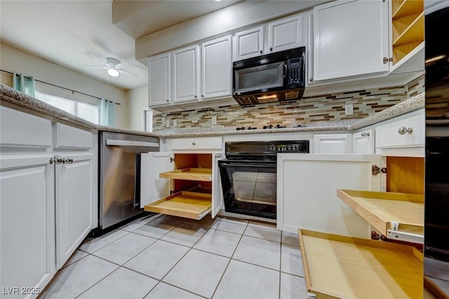 kitchen featuring light tile patterned floors, black appliances, ceiling fan, and white cabinetry