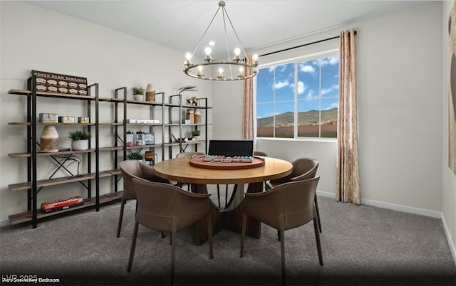 carpeted dining space with a notable chandelier, baseboards, and a mountain view