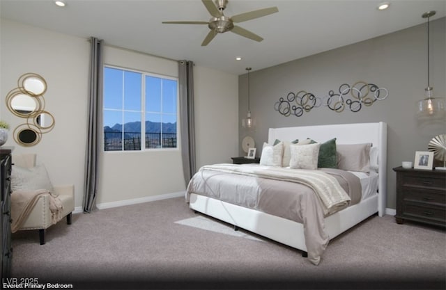 carpeted bedroom featuring baseboards, a mountain view, ceiling fan, and recessed lighting