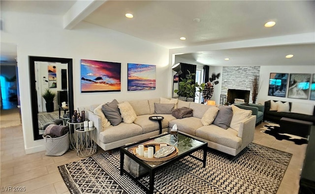 living room featuring vaulted ceiling with beams, light tile patterned floors, recessed lighting, and a stone fireplace