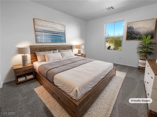 bedroom featuring visible vents and baseboards