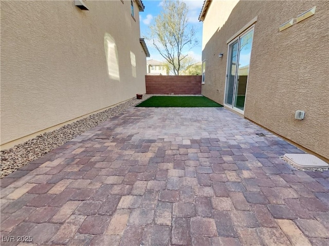 view of patio with a fenced backyard