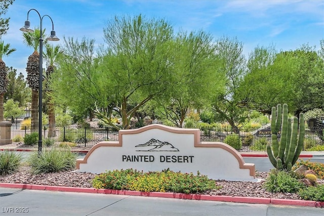 community sign with fence