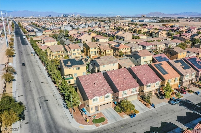 aerial view featuring a mountain view and a residential view