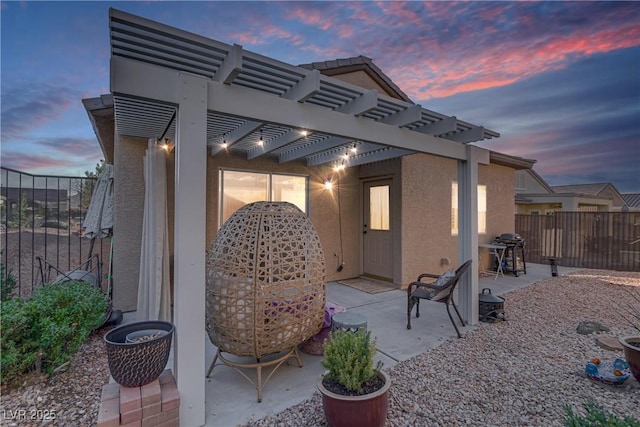 view of patio / terrace with fence and a pergola