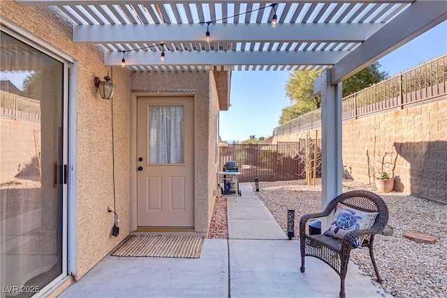 view of patio with a fenced backyard and a pergola