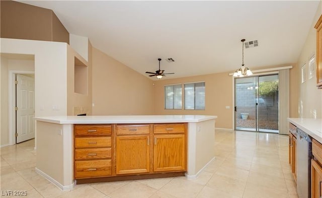 kitchen with light countertops, a kitchen island, visible vents, and decorative light fixtures