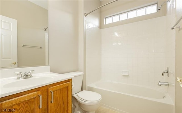 full bathroom featuring washtub / shower combination, vanity, and toilet