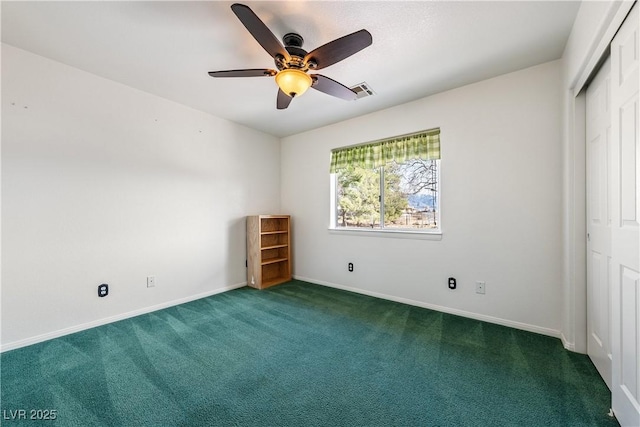 unfurnished bedroom featuring a closet, carpet flooring, visible vents, and baseboards