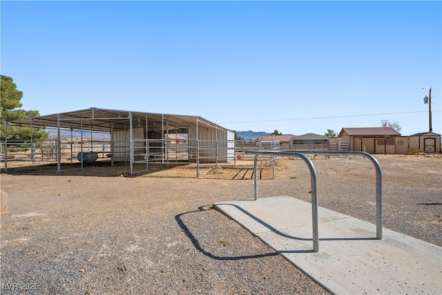 view of yard with an outdoor structure and an exterior structure