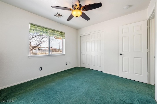 unfurnished bedroom with visible vents, baseboards, ceiling fan, carpet, and a closet