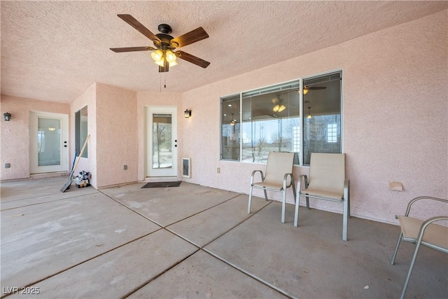 view of patio / terrace featuring visible vents and a ceiling fan