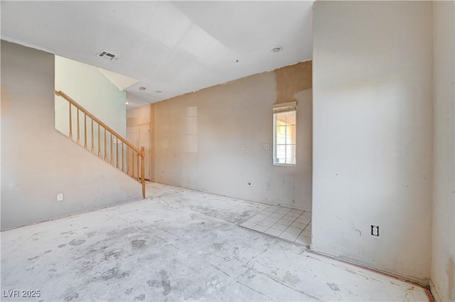 empty room featuring stairs