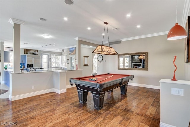 recreation room with billiards, baseboards, ornamental molding, wood finished floors, and recessed lighting