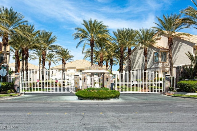 view of gate with fence