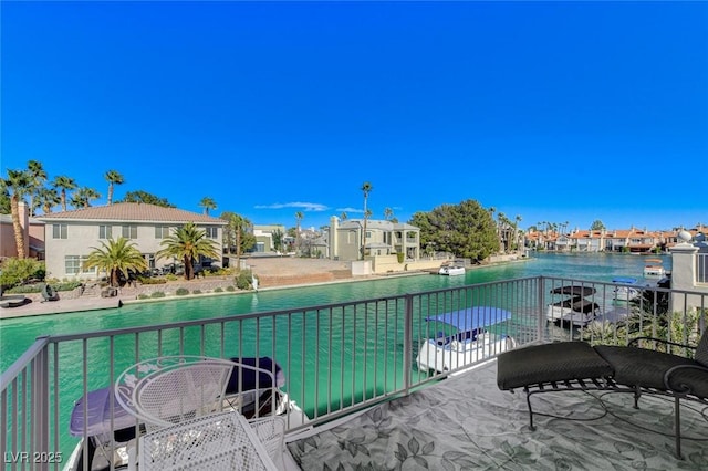 view of swimming pool featuring a residential view