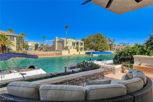 outdoor pool featuring outdoor lounge area, a patio, and fence