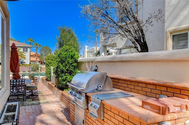 view of patio / terrace with area for grilling