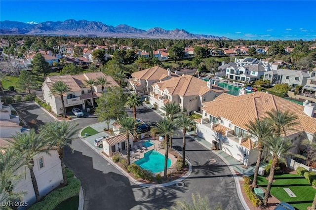 bird's eye view featuring a mountain view and a residential view