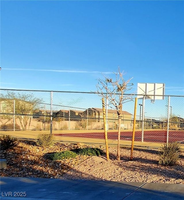 7910 Shimmery St, North Las Vegas, NV 89084 - view of yard with community basketball court