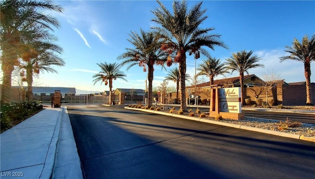 7910 Shimmery St, North Las Vegas, NV 89084 - view of swimming pool with a gate